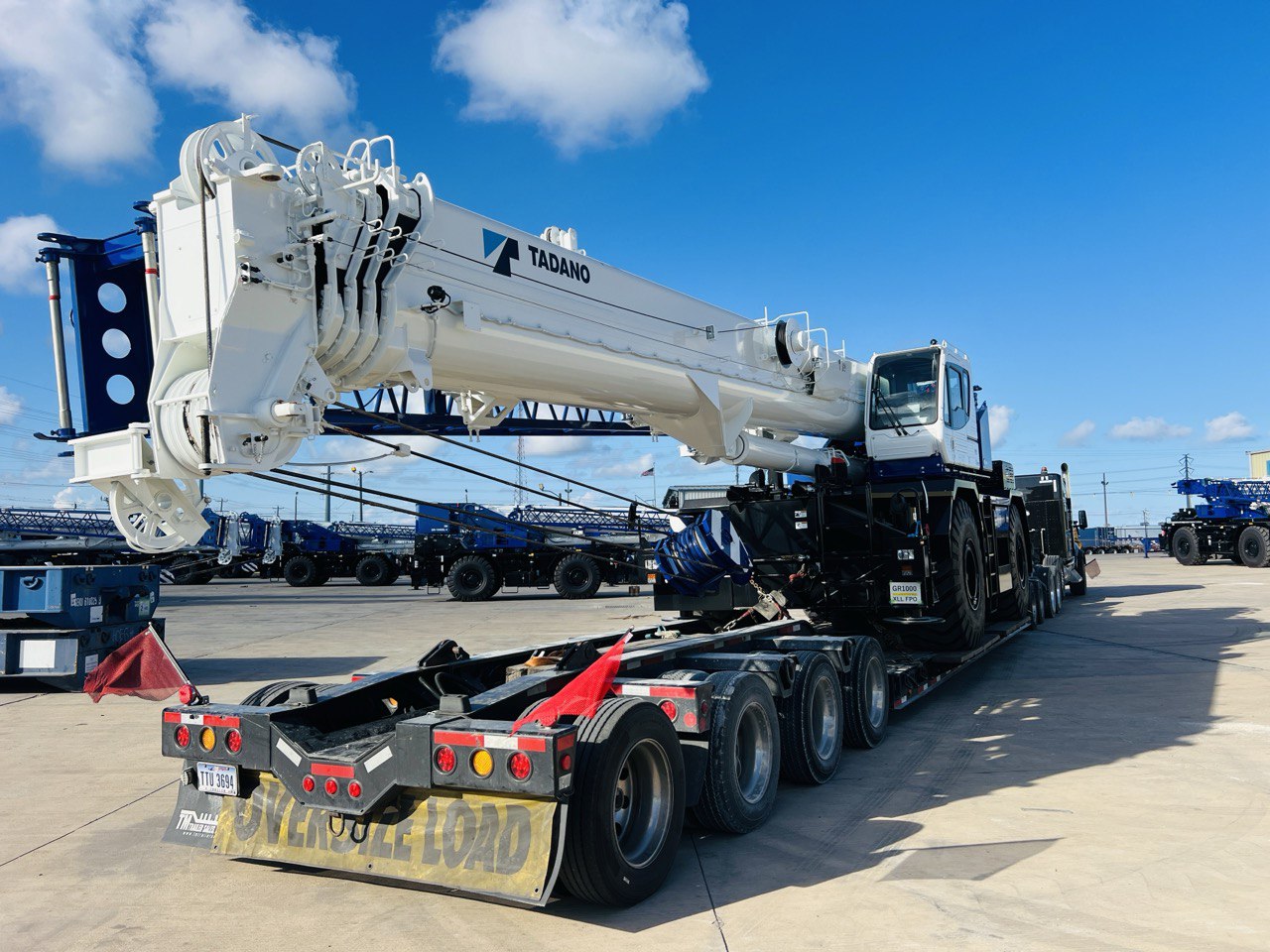 Tadano crane on multi-axle lowboy with OVERSIZE LOAD plate